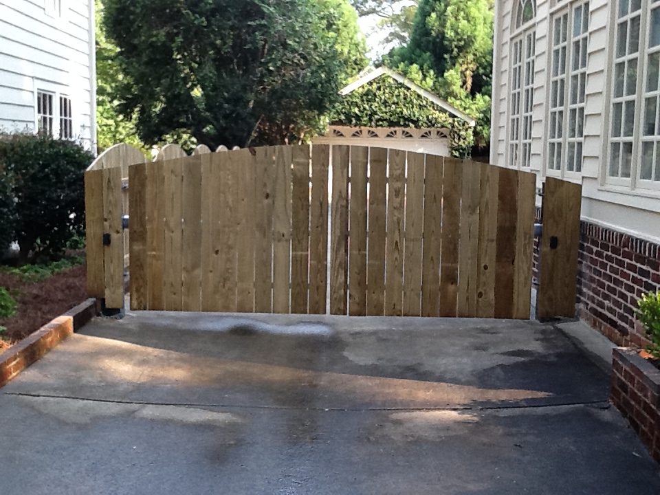 Modern wooden privacy gate installation